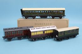 Four various boxed Darstaed railway coaches, to include a GWR 'Guard Van', Southern Parcels Van