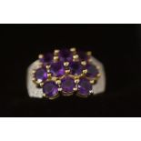 9ct Gold ring set with purple stones & diamonds