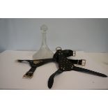 Leather dog harness together with a ships decanter