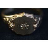 9ct Gold ring set with central diamond Weight 7g