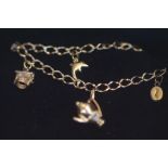 9ct Gold charm bracelet with 5 charms Weight 5.6g