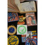 Collection of Speedway patches together with a com