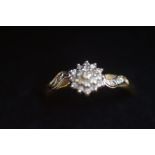 9ct Gold ring set with diamond cluster Size Q