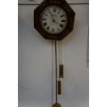 Early pendulum clock with brass weights & brass in