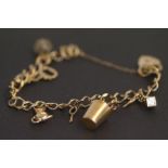 9ct Gold charm bracelet Weight 12.6g