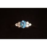 9ct Gold ring set with aquamarine & clear stones S
