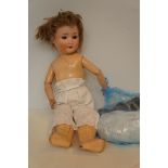 SH PB 1909 Germany doll together with clothing