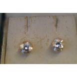 Pair of 14ct Gold solitaire earrings