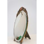 An original floral bevelled free standing mirror H