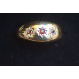 9ct Gold ring set with 3 red stones Size M