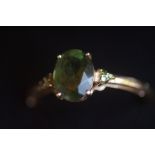 9ct Gold ring set with green stones Size S