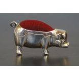 Silver pig pin cushion