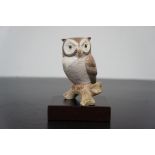 Lladro figure of an owl on wooden plinth