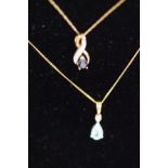 9ct Gold chains & pendants, one with dark blue sto