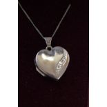 9ct White gold heart locket set with diamonds