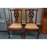 Pair of Georgian chairs raised on pad feet