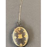 Tortoise shell & brass inlaid locket