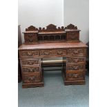 Early twin pedestal desk with lion mask drawers