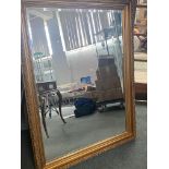 Large bevelled mirror with gilt frame 136 x 104 cm