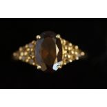 9ct Gold ring set with large Smokey quarts & small