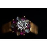 9ct Gold ring set with diamonds & rubies Weight 6g