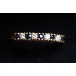 9ct Gold ring set with sapphires & clear stones Si