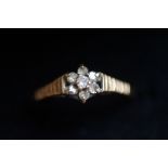 9ct Gold ring set with 7 diamonds Size M