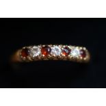 9ct Gold ring set with rubies & clear stones Size
