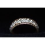 Gold ring tested for 9ct gold set with diamonds Si