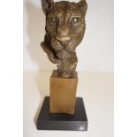 Bronze cheetah bust on marble base signed