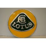 Chrome yellow & green lotus sign