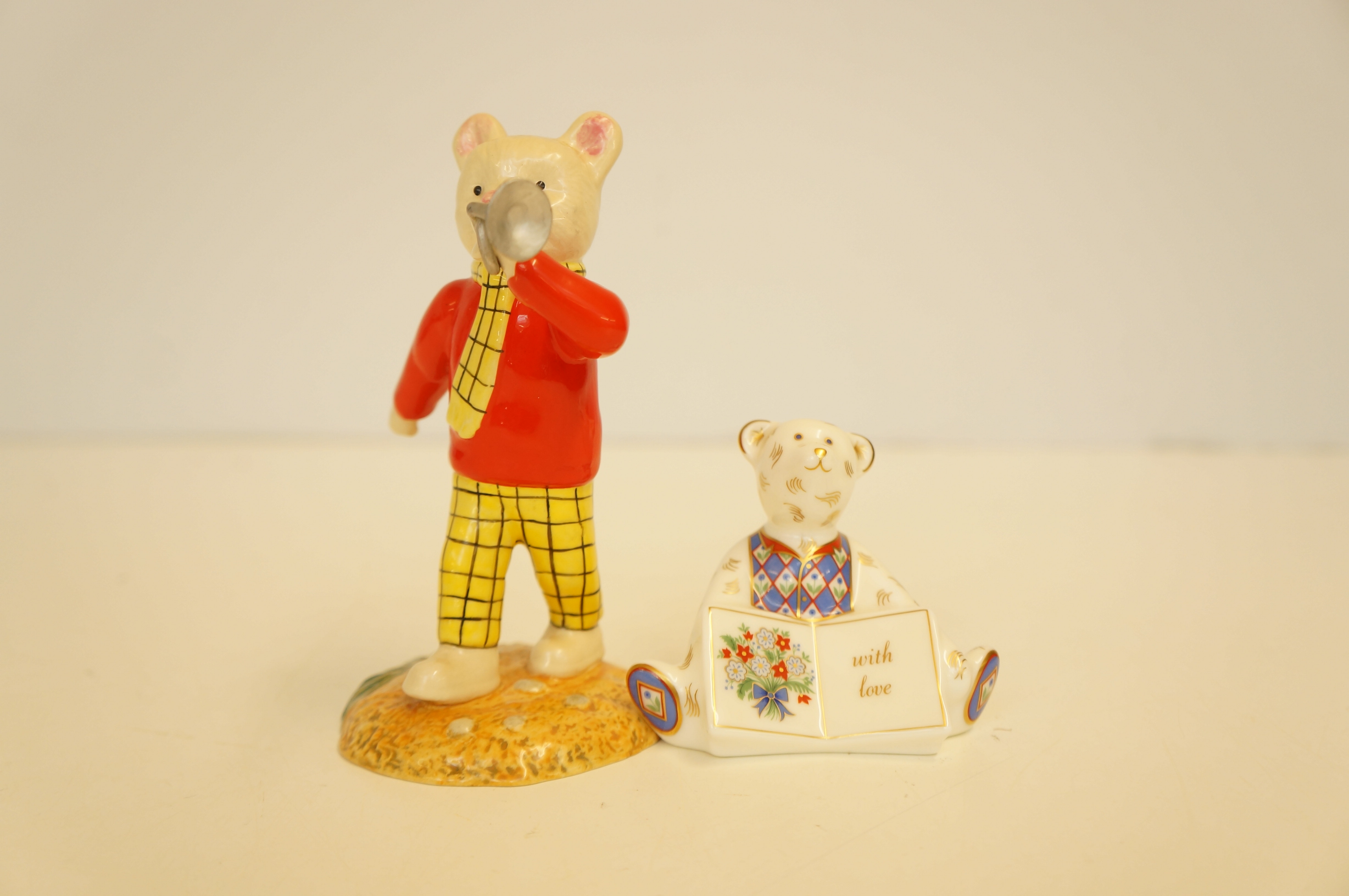 Royal crown derby bear together with a royal Doult