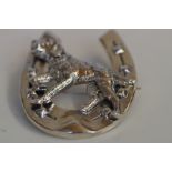 Silver large hunting dog in horse shoe brooch