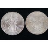 2x 1oz American silver dollars