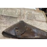Possibly WWII leather holster together with a earl