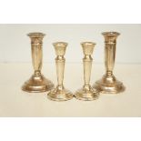 2 pairs of silver candle sticks