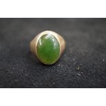 9ct gold gents ring set with green hard stone Size