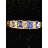 18ct Gold ring set with 4 sapphires & diamonds Siz