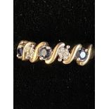 9ct Gold ring set with sapphire & diamonds Size Q