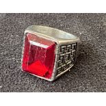 Heavy silver ring with large red stone