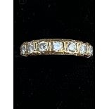 9ct Gold ring set with 7 round cut diamonds