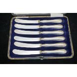 Cased set of silver butter knives