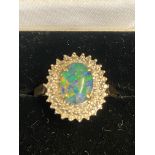 9ct Gold ring set wth opal & diamonds Weight 3.7g