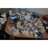 Large collection of novelty teapots