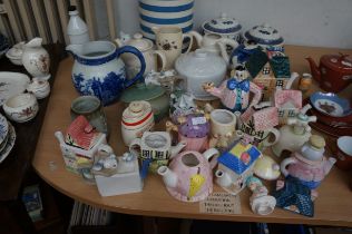 Large collection of novelty teapots