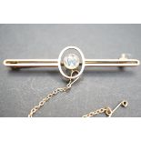 9ct Rose gold pin brooch set with possibly topaz o
