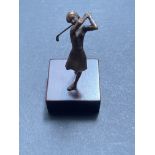 Bronze figure of lady golfer