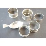 5 Silver napkin rings together with a silver heart