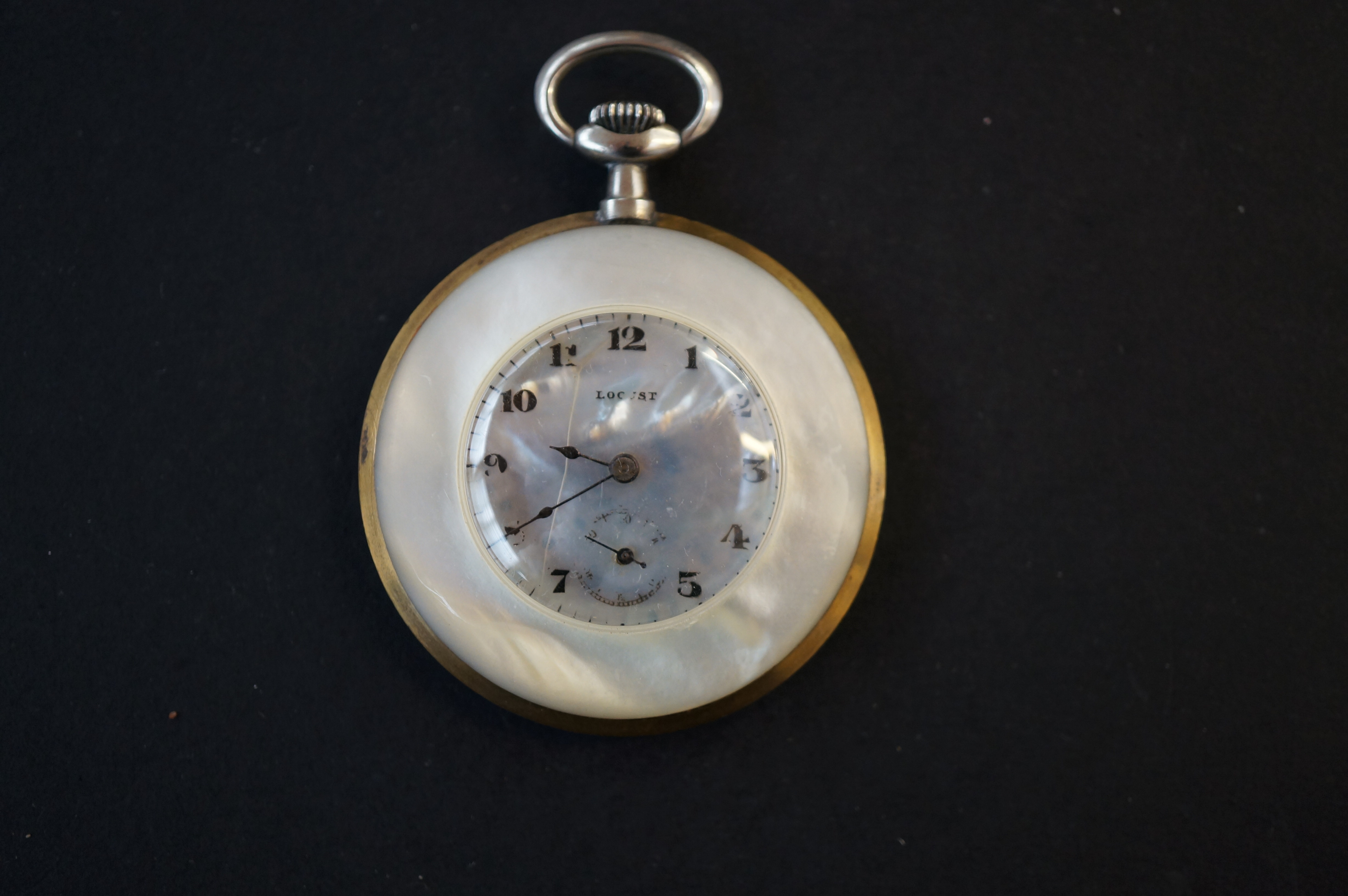 Locust mother of pearl pocket watch - currently ti