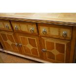 Very good quality 3 drawer sideboard raised on bun